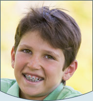 smiling boy with braces