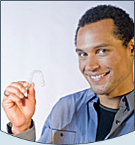 photo of man with invisalign appliance